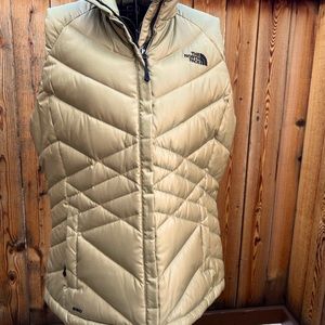 The North Face down vest. Women’s size Large. Gold